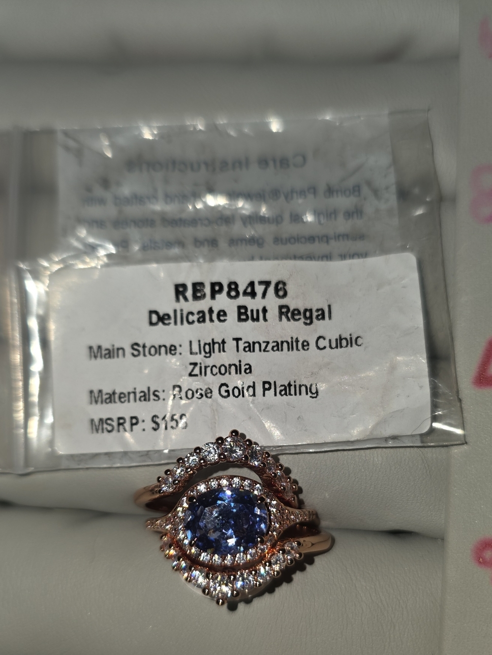 Delicate But Regal Rose Gold Ring with Light Tanzanite Cubic Zirconia